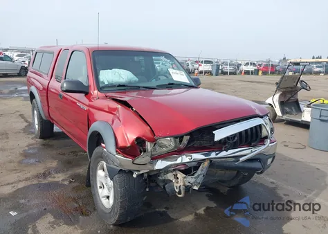 2002 Toyota Tacoma из США, поврежденный, VIN 5TEWM72NX2Z121069